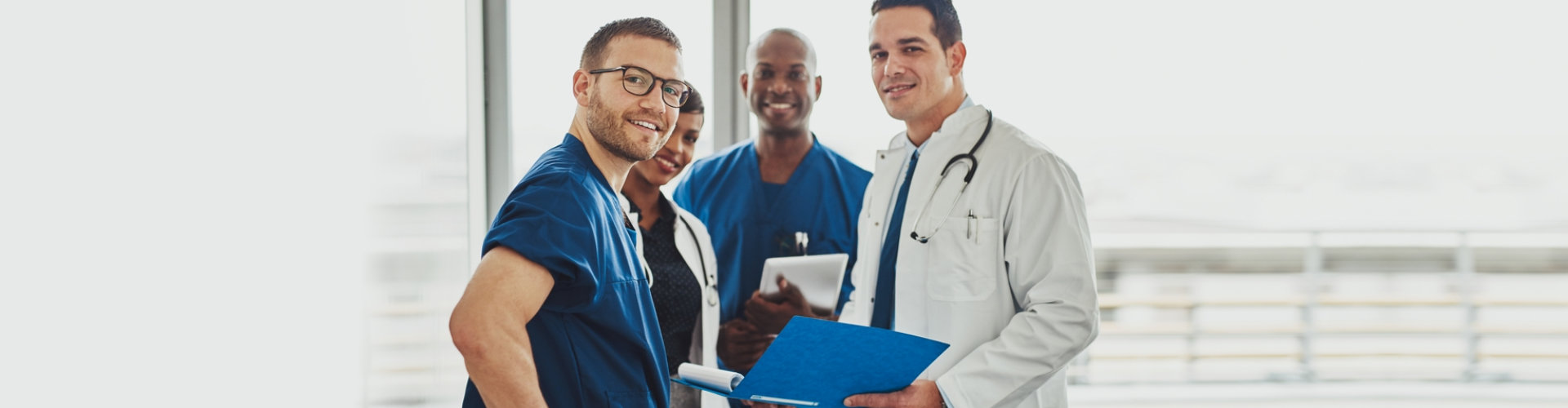 a group of healthcare personnel smiling